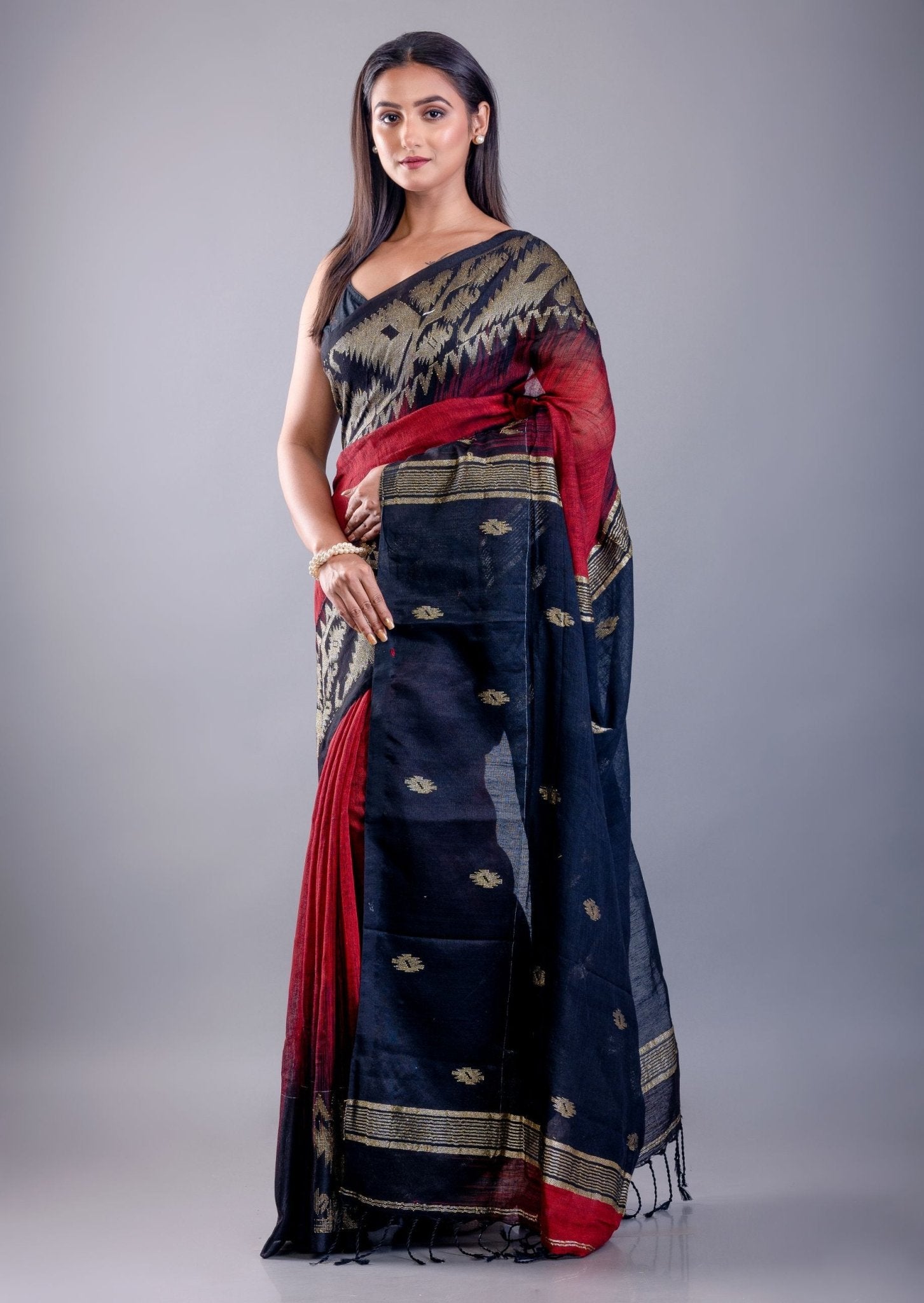 Black saree look with red ombre Jamdani floral motif drape