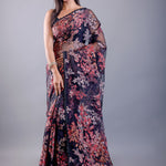 Black tissue silk saree look with floral print and elegant drape
