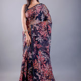 Black tissue silk saree look with floral print and elegant drape