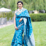 Blue Silk Banarasi Saree with Silver Floral Motifs and Matching Unstitched Blouse - Anvi Couture