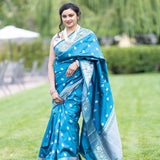 Blue Silk Banarasi Saree with Silver Floral Motifs and Matching Unstitched Blouse - Anvi Couture