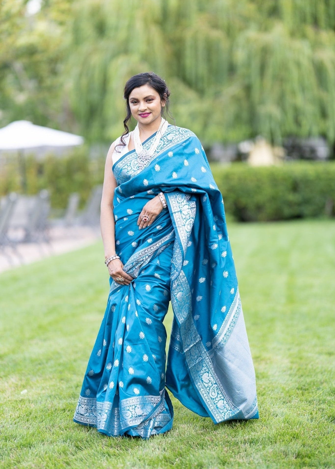 Blue Silk Banarasi Saree with Silver Floral Motifs and Matching Unstitched Blouse - Anvi Couture