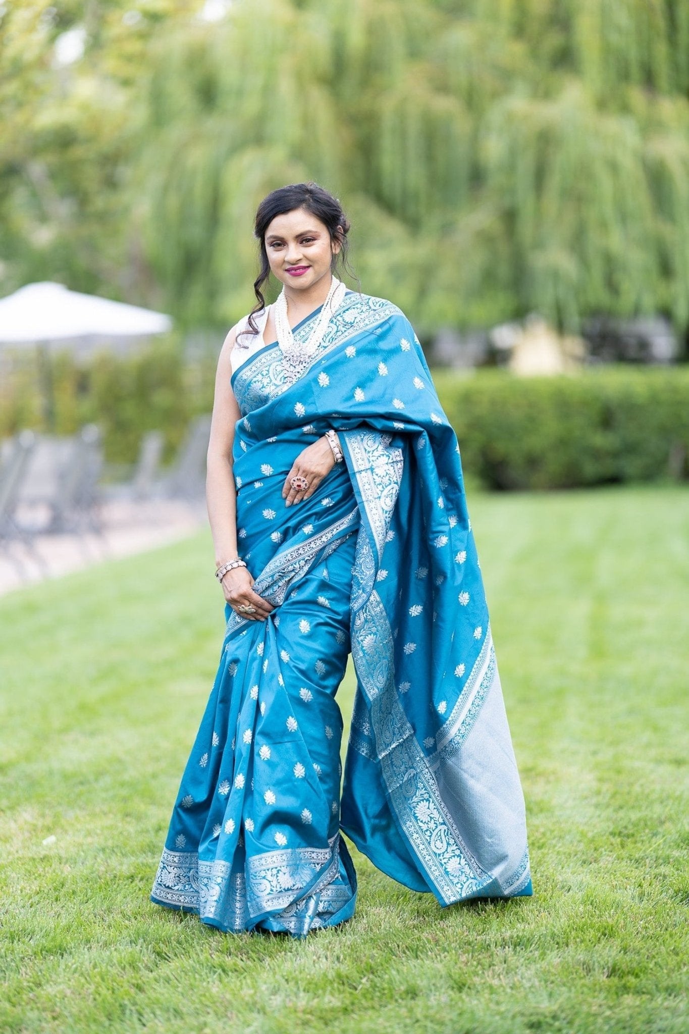 Blue Silk Banarasi Saree with Silver Floral Motifs and Matching Unstitched Blouse - Anvi Couture