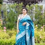 Blue Silk Banarasi Saree with Silver Floral Motifs and Matching Unstitched Blouse - Anvi Couture