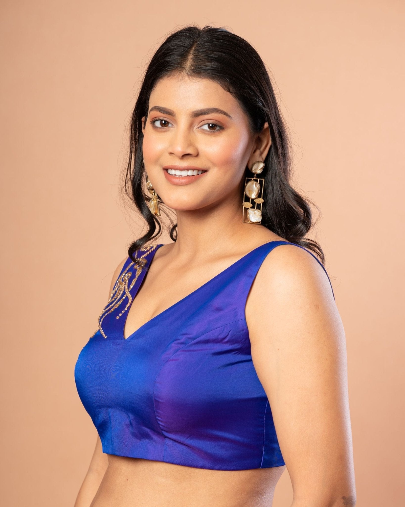 embroidery pattern on Blue Pure Silk V Neck Blouse - side