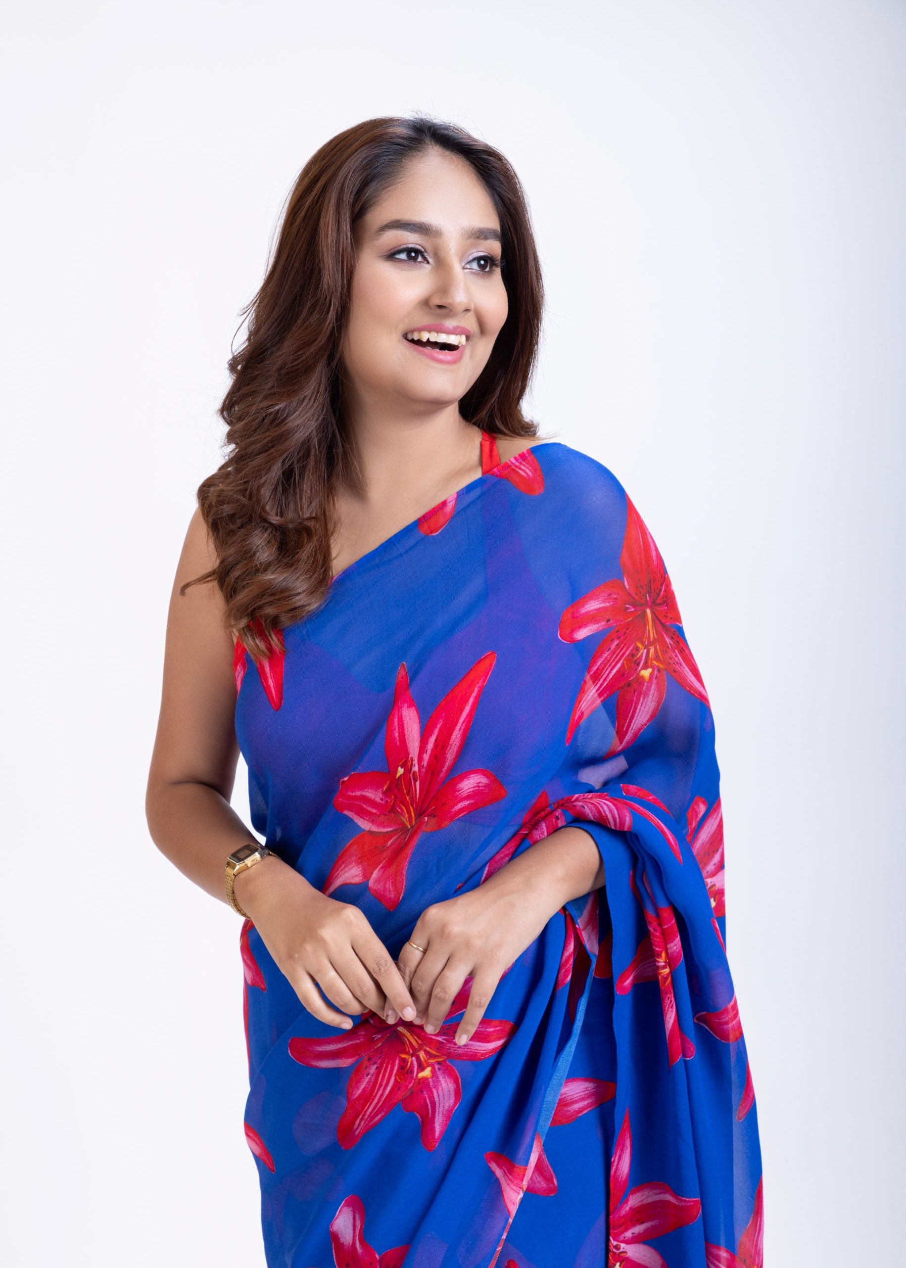 Blue Georgette Saree With Red Floral Print Saree Close Up

