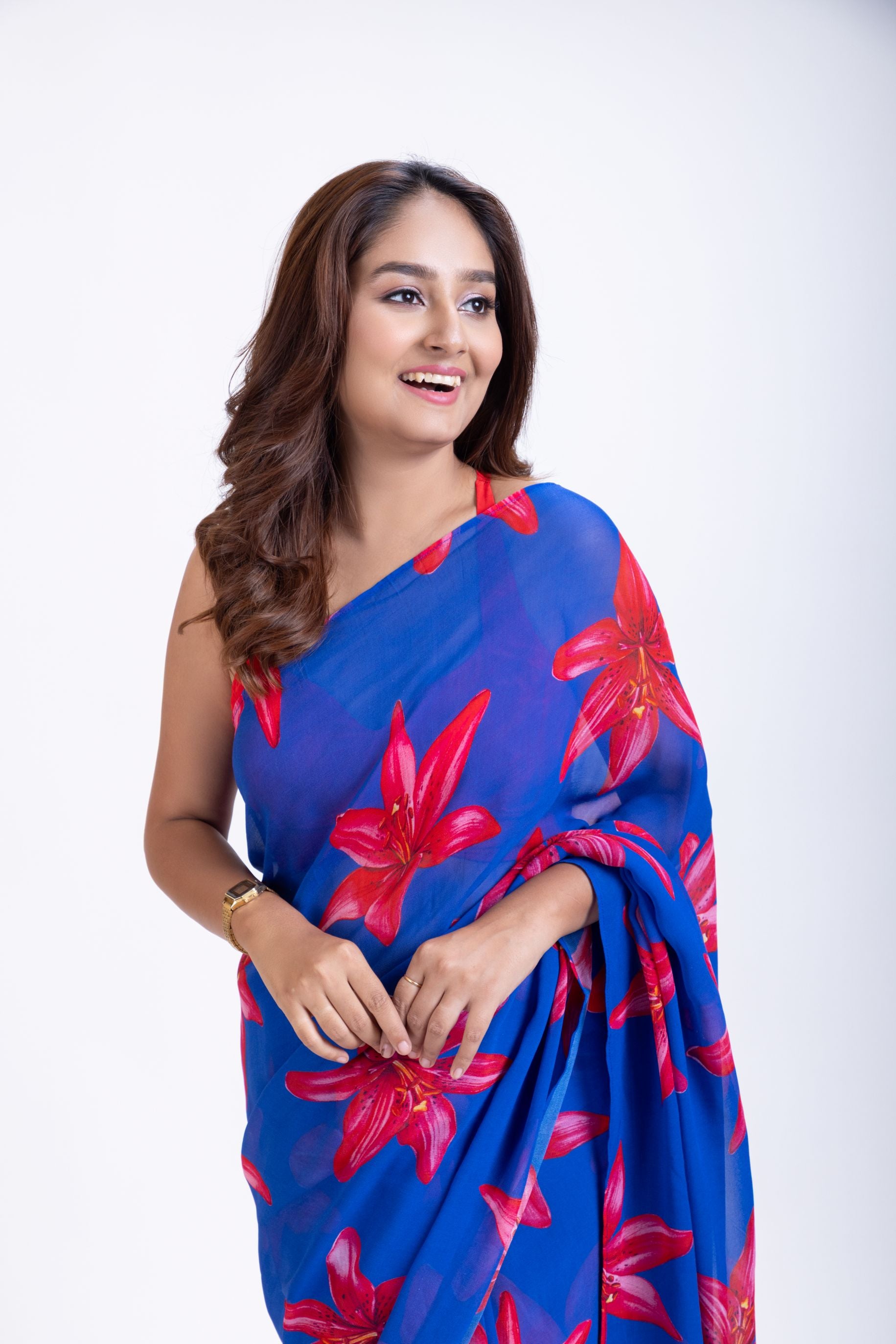 Blue Georgette Saree With Red Floral Print Saree Close Up

