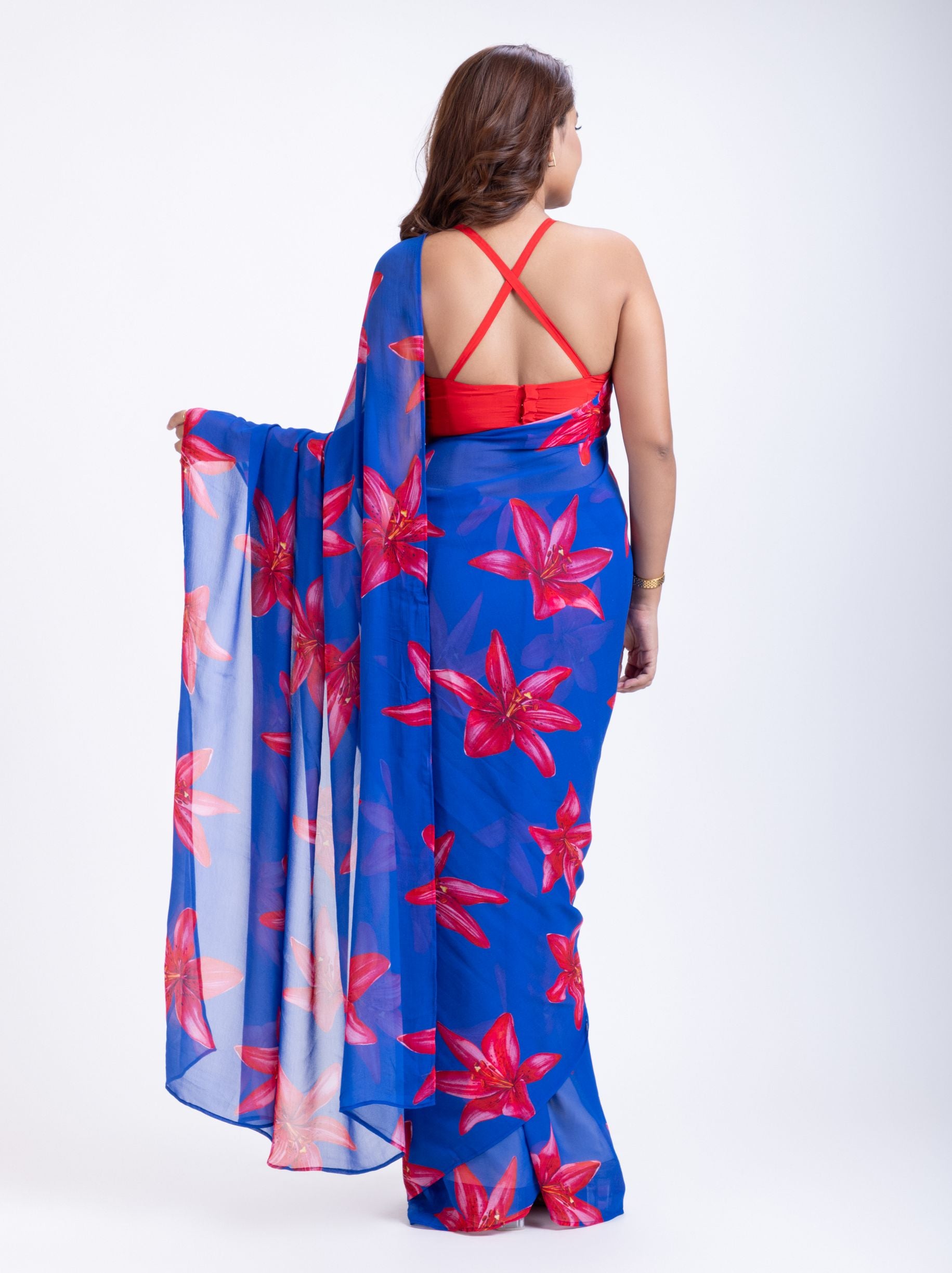 Blue Georgette Saree With Red Floral Print Saree Back

