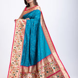 Blue Paithani Saree With Pink Border Front
