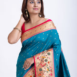 Blue Paithani Saree With Pink Border Close Up
