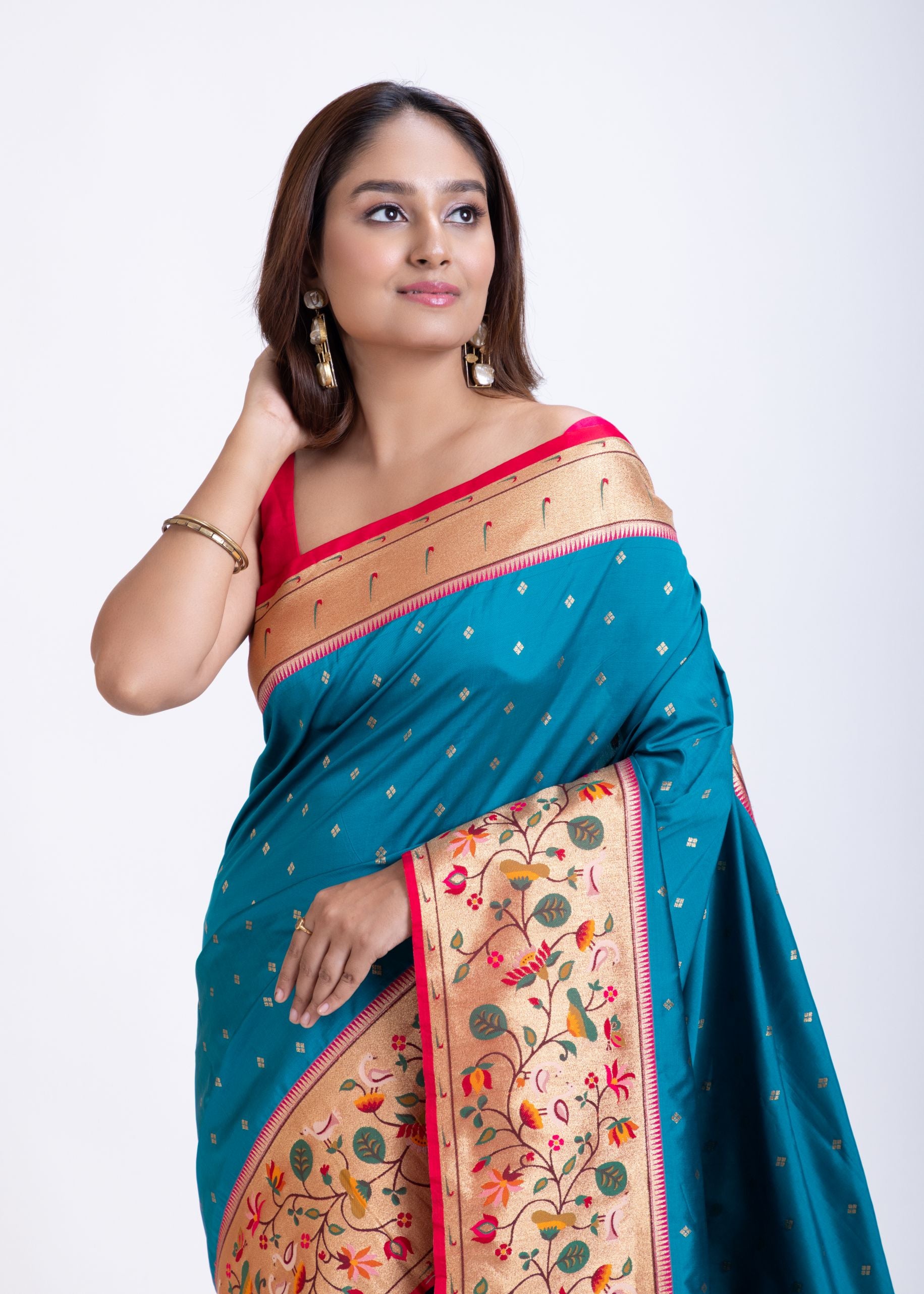 Blue Paithani Saree With Pink Border Close Up
