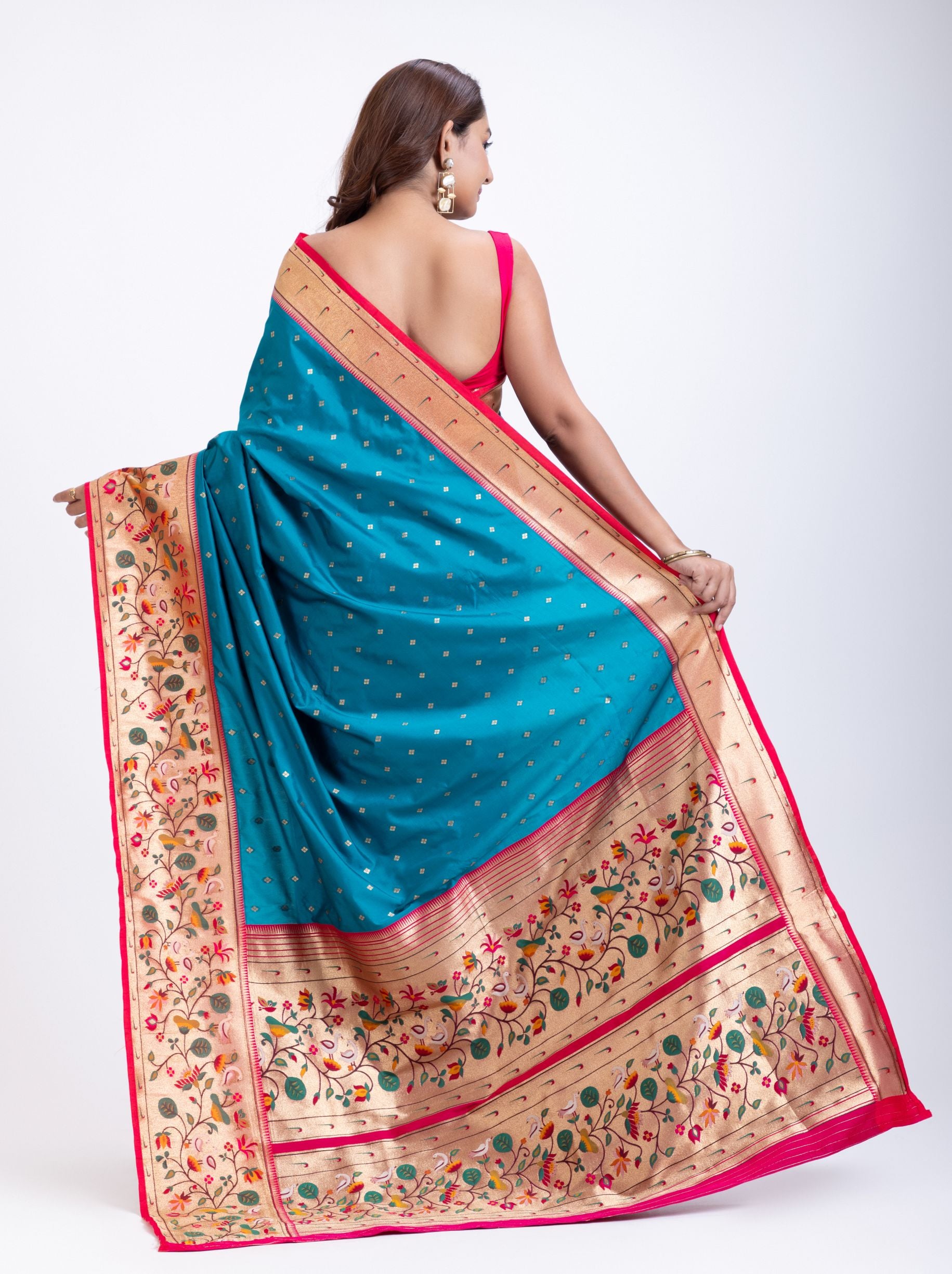 Blue Paithani Saree With Pink Border Back
