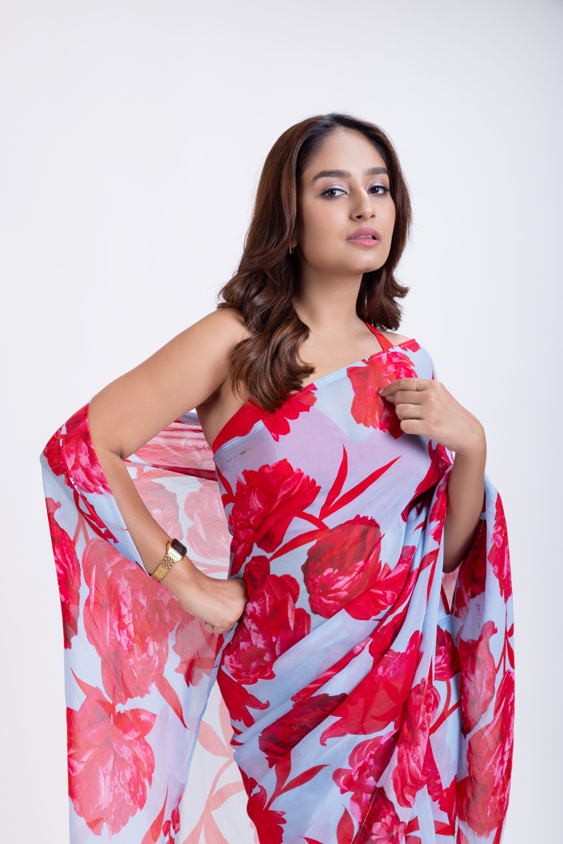 Blue Silk Organza Saree With Red Floral Prints Close Up
