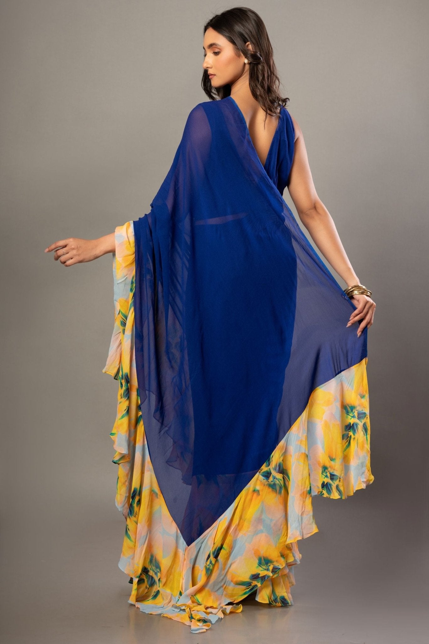 Blue and yellow ruffle saree set — back view showing pallu and blouse, Anvi Couture - Back