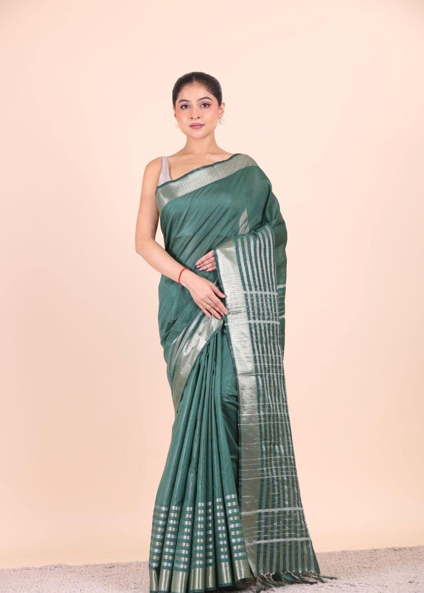Bottle Green Silk Handloom Saree With Silver Woven Border - Anvi Couture