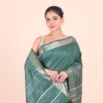 Bottle Green Silk Handloom Saree With Silver Woven Border Close Up View