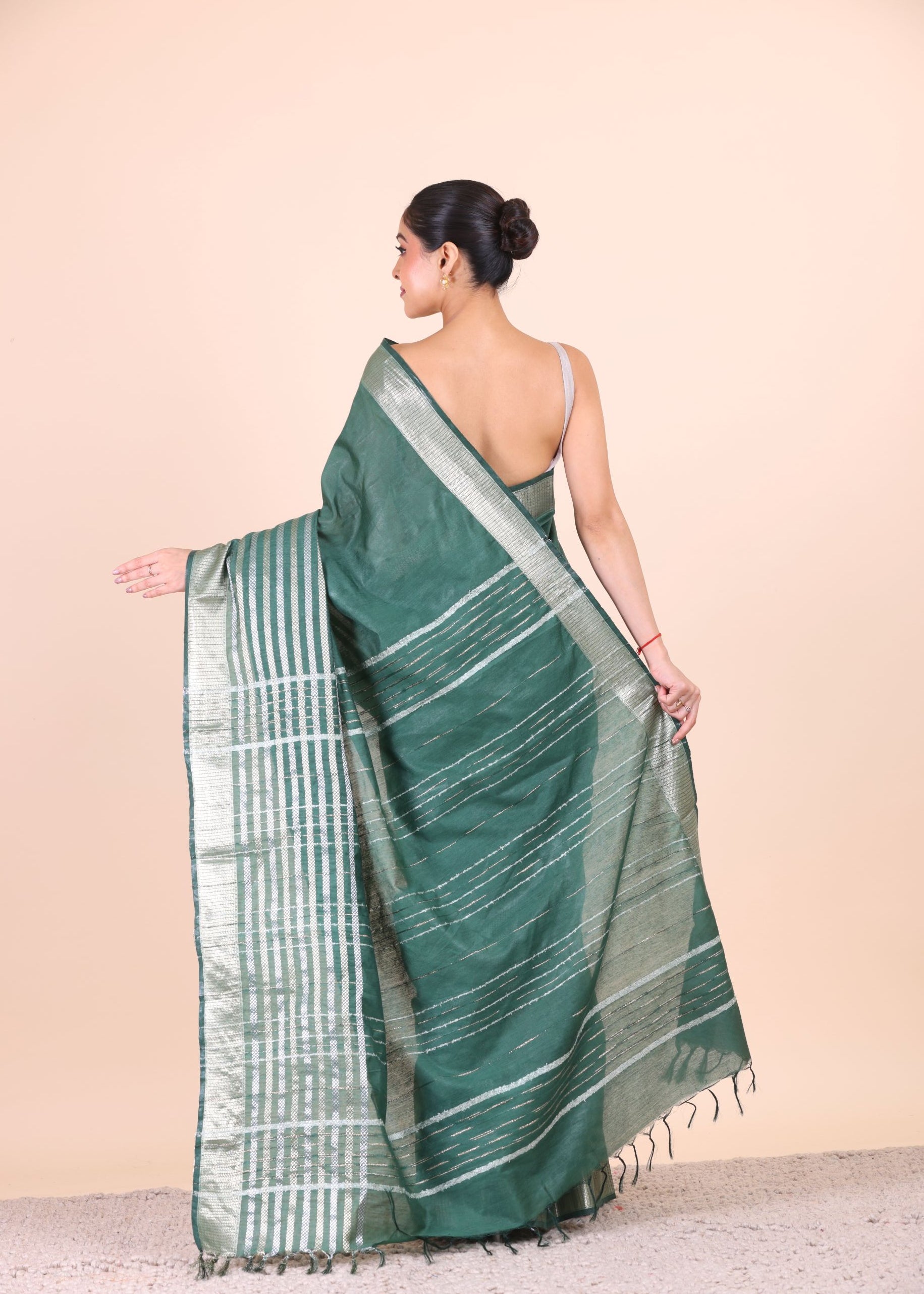 Bottle Green Silk Handloom Saree With Silver Woven Border Back View