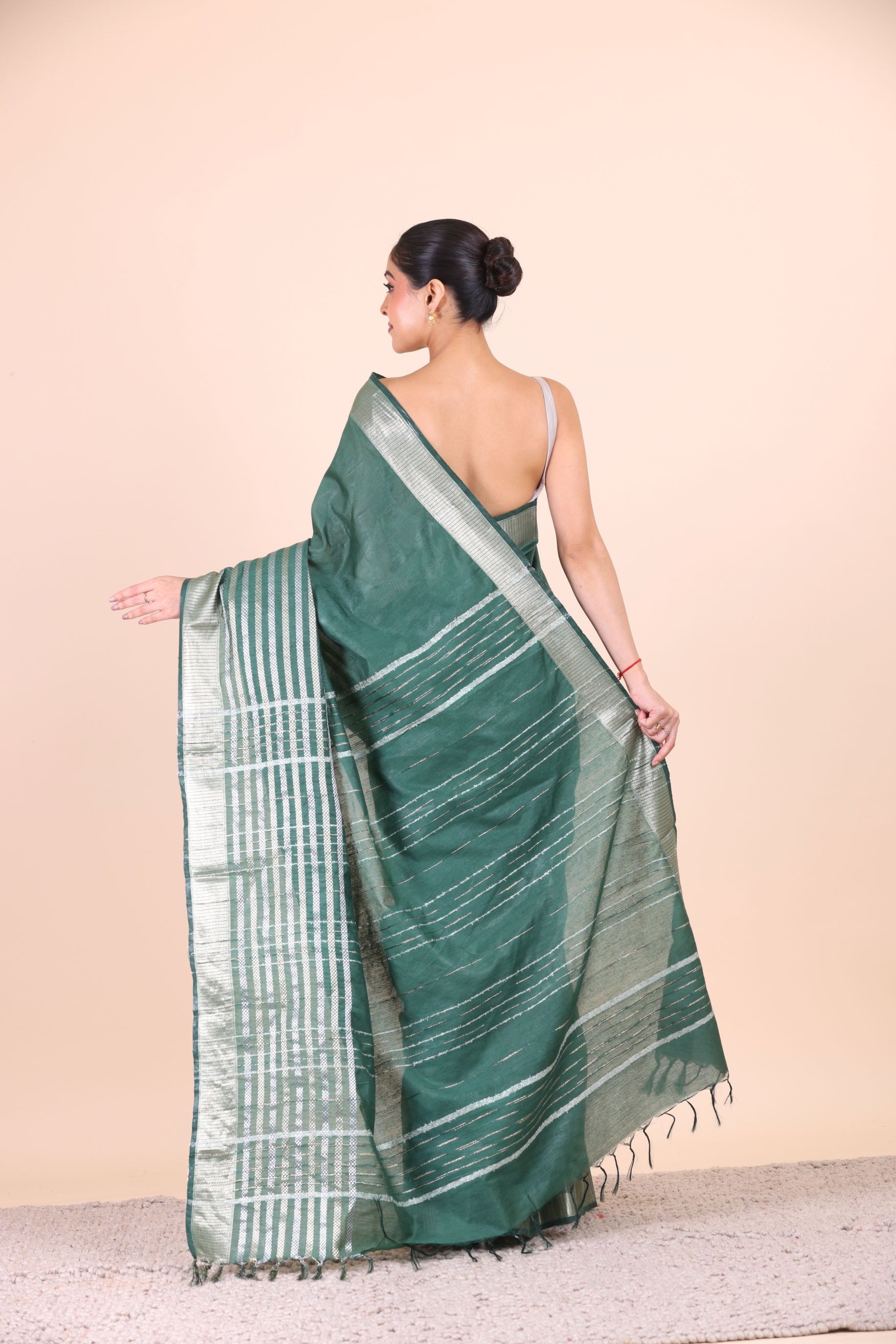 Bottle Green Silk Handloom Saree With Silver Woven Border Back View
