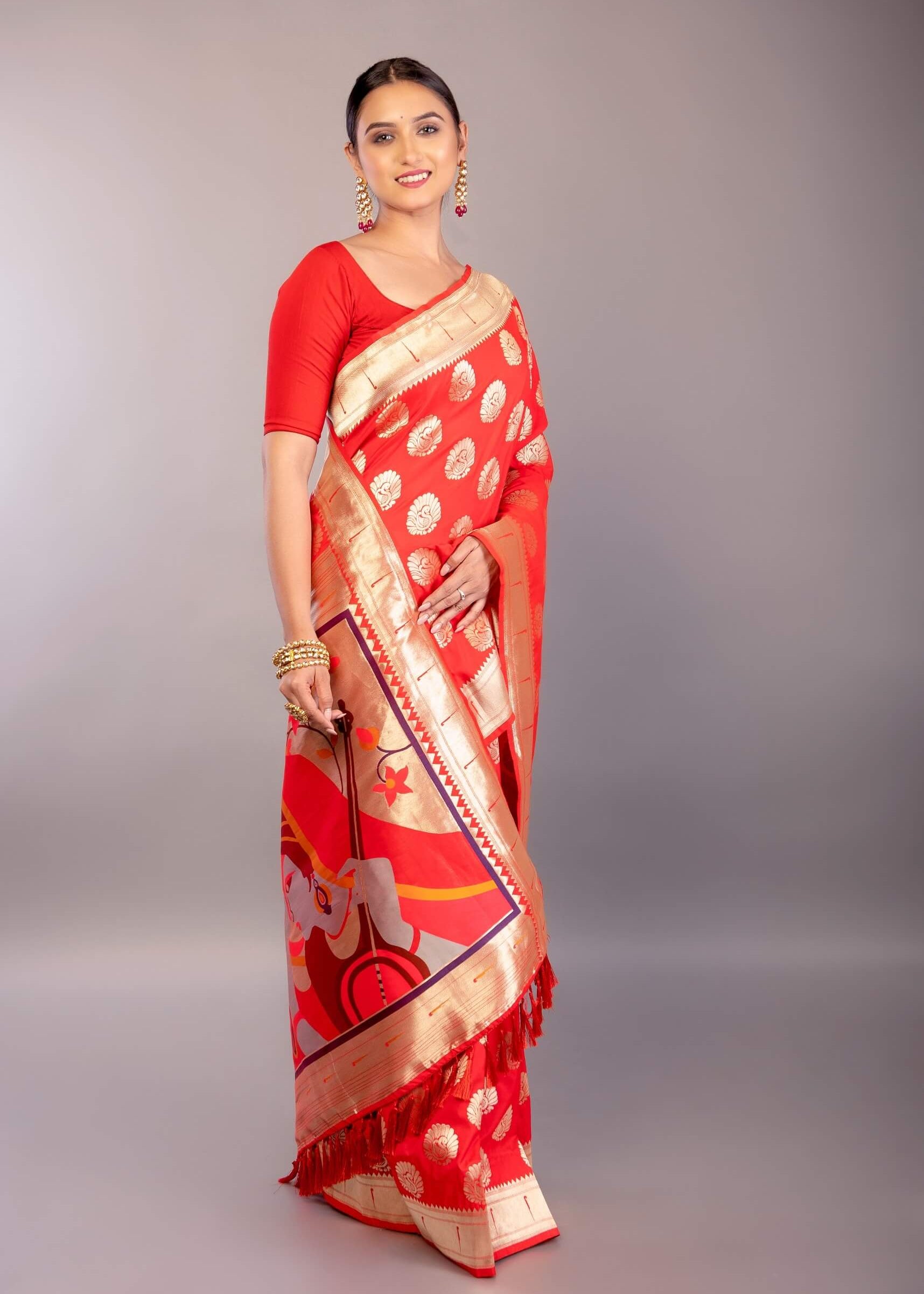 Bright Red Paithani Silk Saree – Gold Zari Peacock Motif Close-Up – Anvi Couture