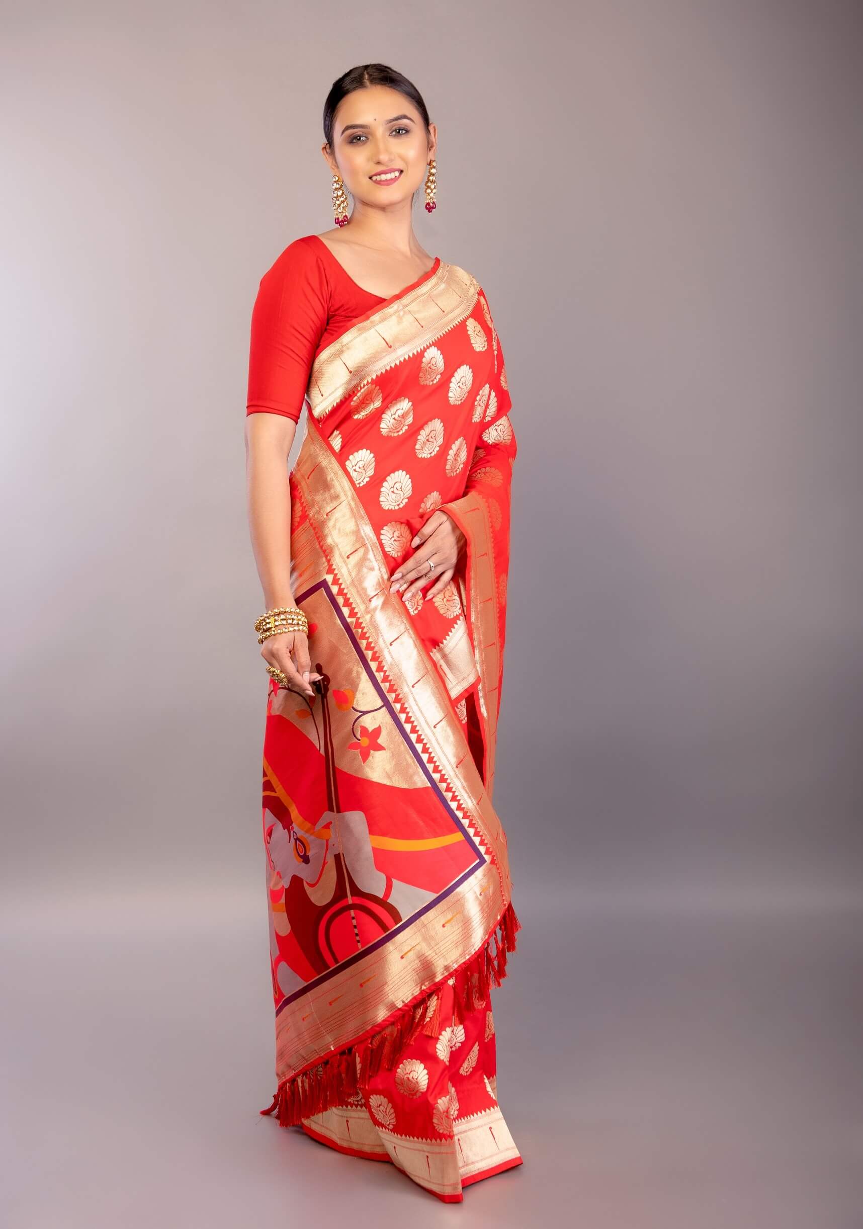 Bright Red Paithani Silk Saree – Gold Zari Peacock Motif Close-Up – Anvi Couture