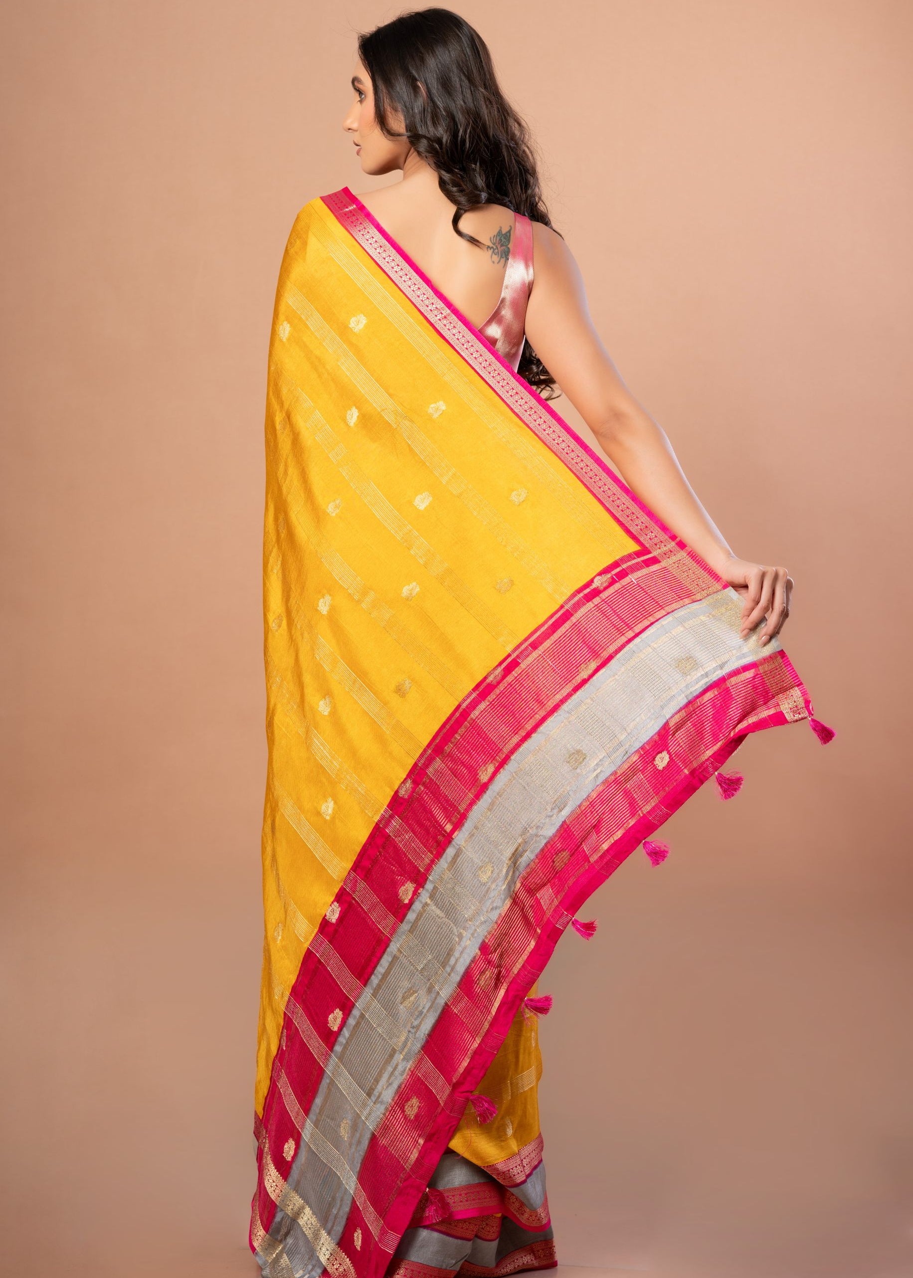 Bright Yellow Silk Saree with Pink and Gyey Border Back 
