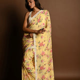 Butter Yellow Georgette Saree with Floral Prints and Pearl Border - Anvi Couture