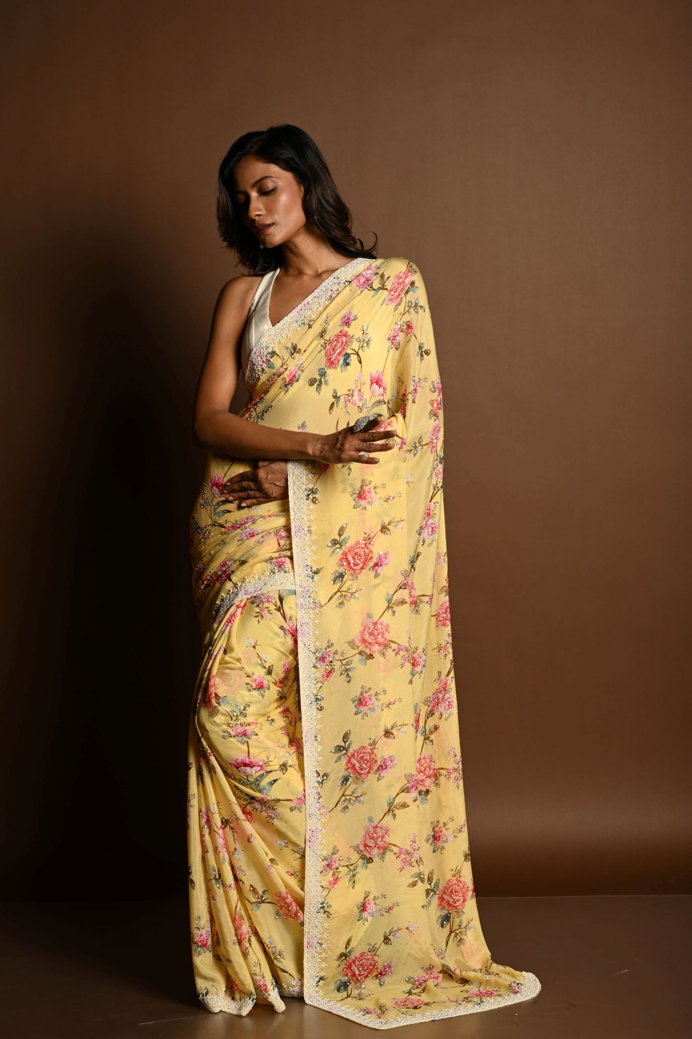 Butter Yellow Georgette Saree with Floral Prints and Pearl Border - Anvi Couture