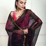 Close-up of printed pattern on dark navy blue chiffon saree