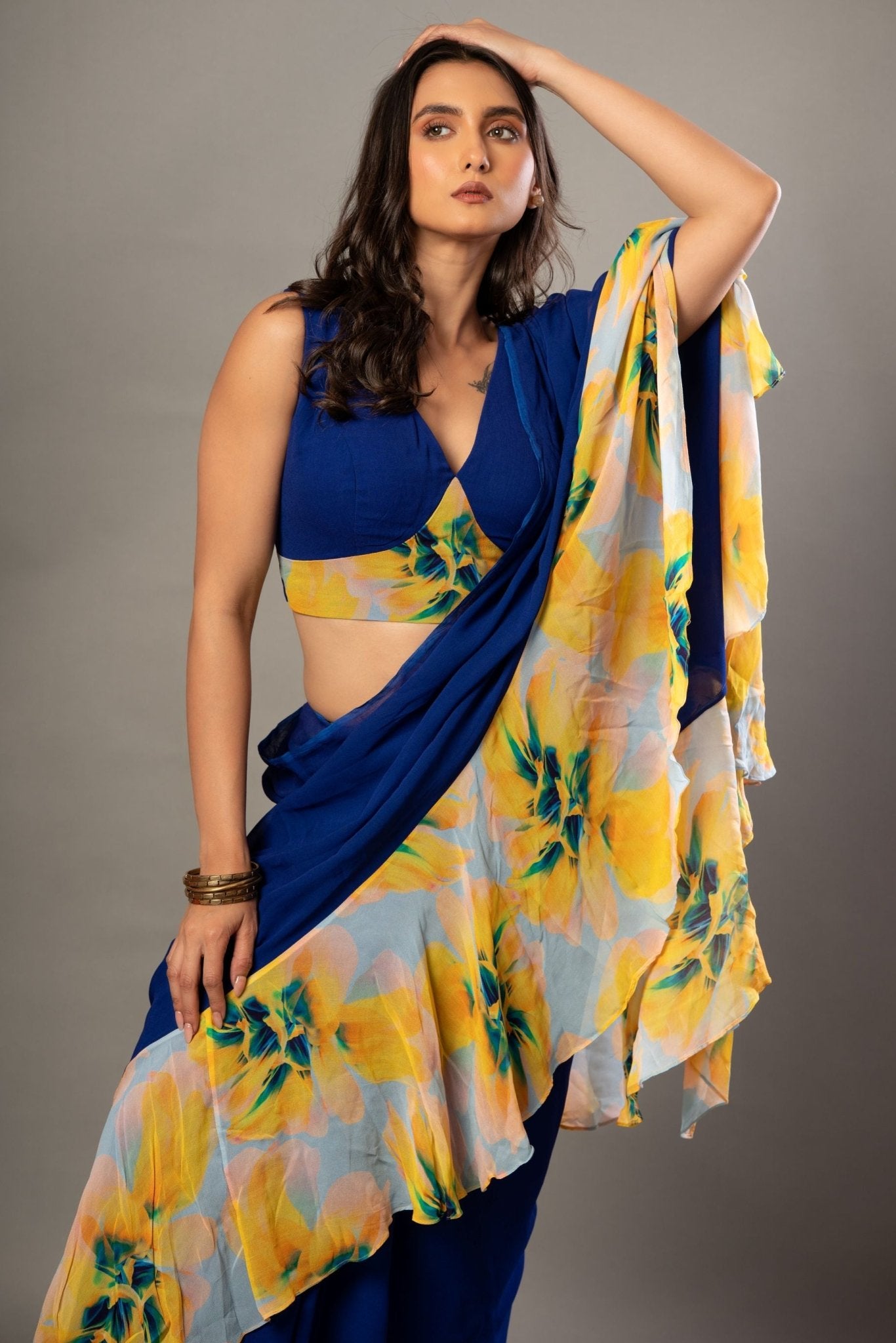 Close-up of ruffle detailing on blue and yellow designer saree set, Anvi Couture - Front 3