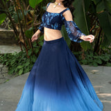Coastal blue ombre lehenga — side view highlighting the blue-to-white shaded gradient on flared skirt