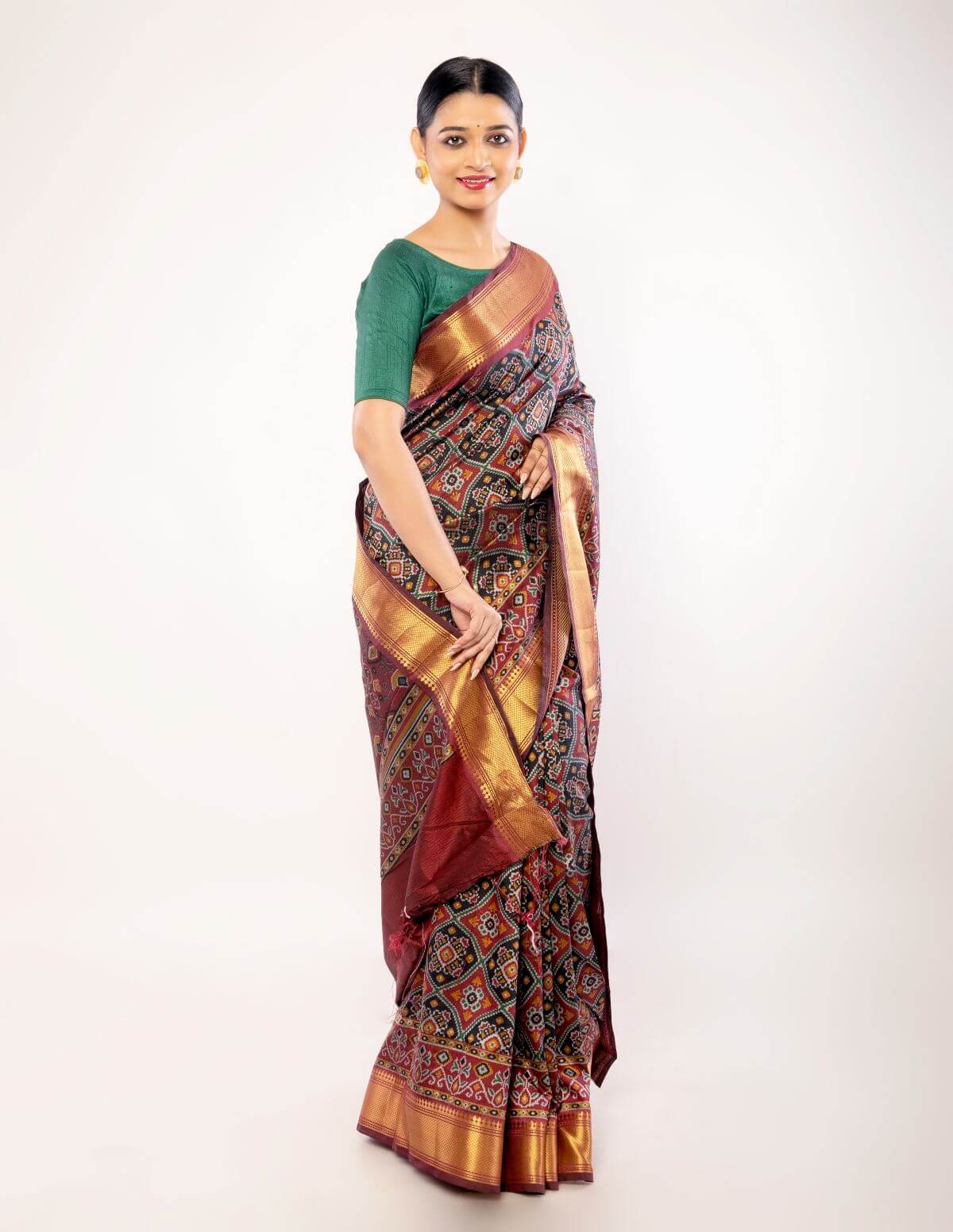 Maroon Patola Silk Saree with Contrasting Gold Zari Border - Anvi Couture