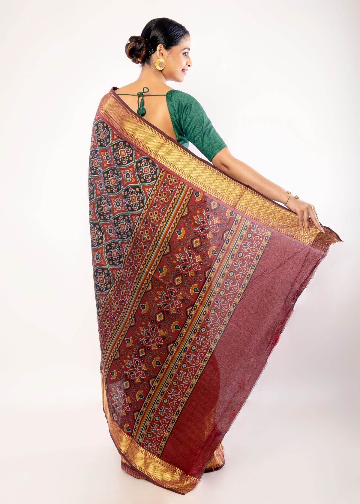 Maroon Patola Silk Saree with Contrasting Gold Zari Border - Anvi Couture