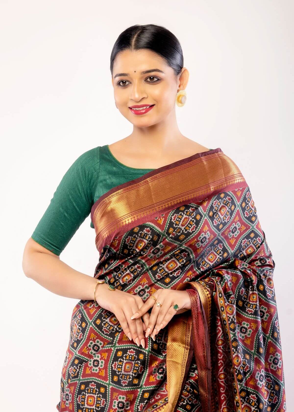 Maroon Patola Silk Saree with Contrasting Gold Zari Border - Anvi Couture