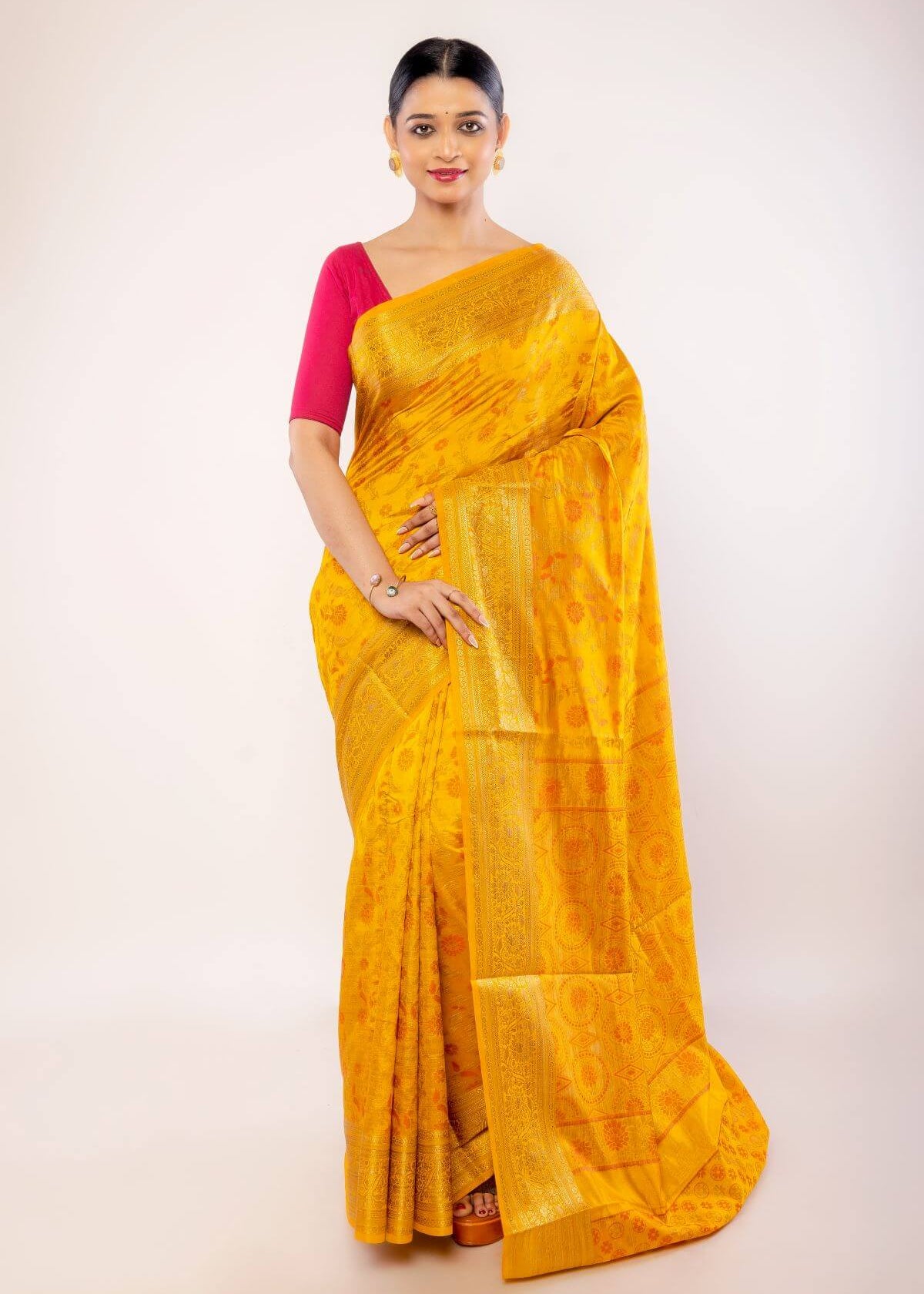 Yellow Art Silk Saree with Gold Zari Border and Orange Floral Motifs - Anvi Couture