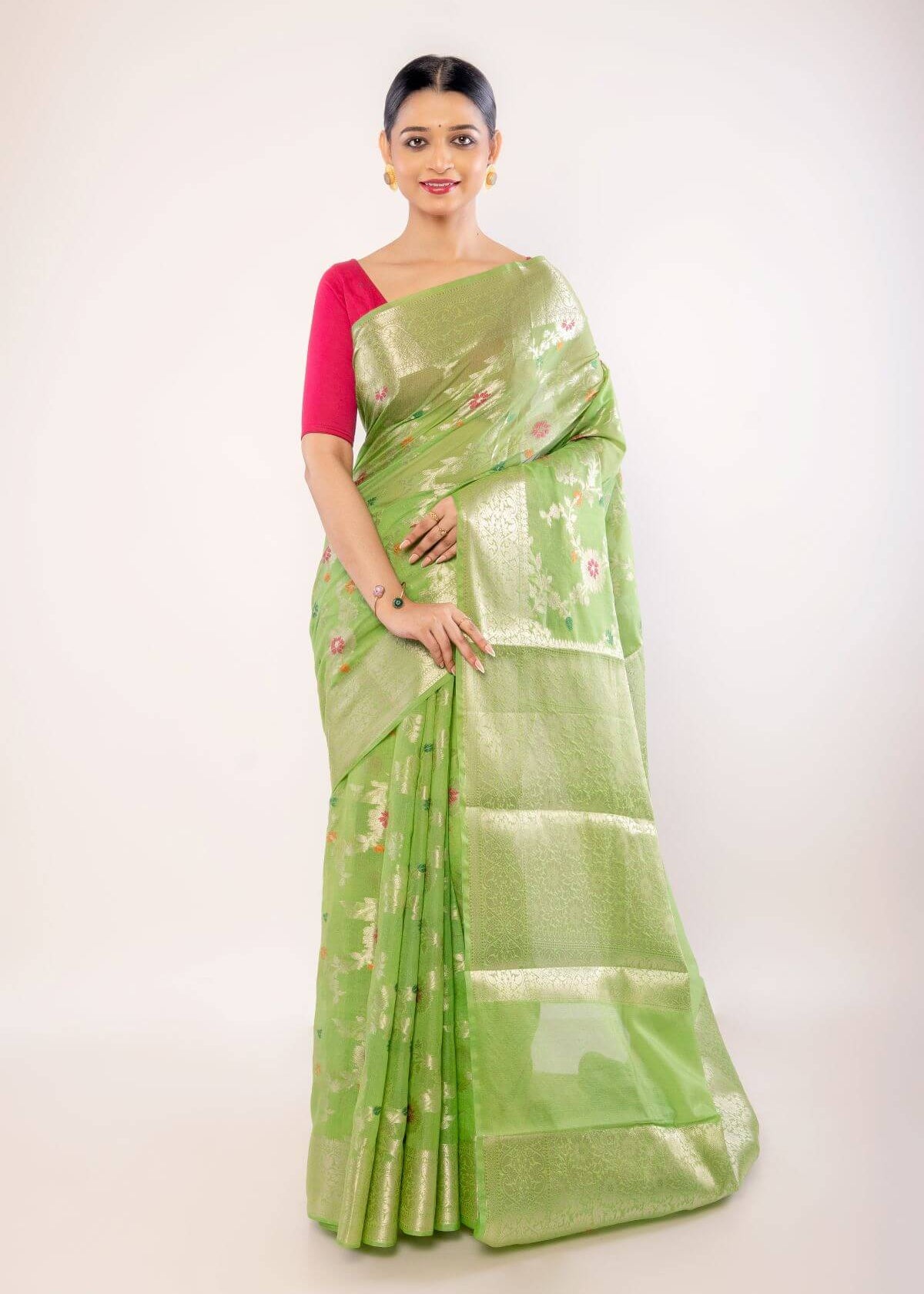 Green Art Silk Saree with Golden and Pink Floral Motifs - Anvi Couture