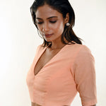 Peach Organza Blouse with a deep V-neck and elbow-length sleeves - Anvi Couture