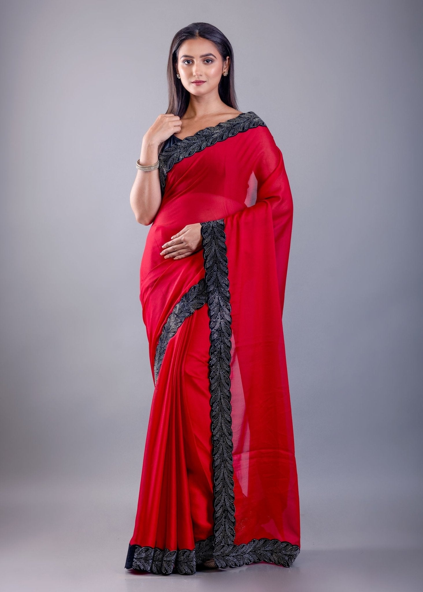 Red Jimmy Choo Saree with Black Stone Emblishment Border - Anvi Couture