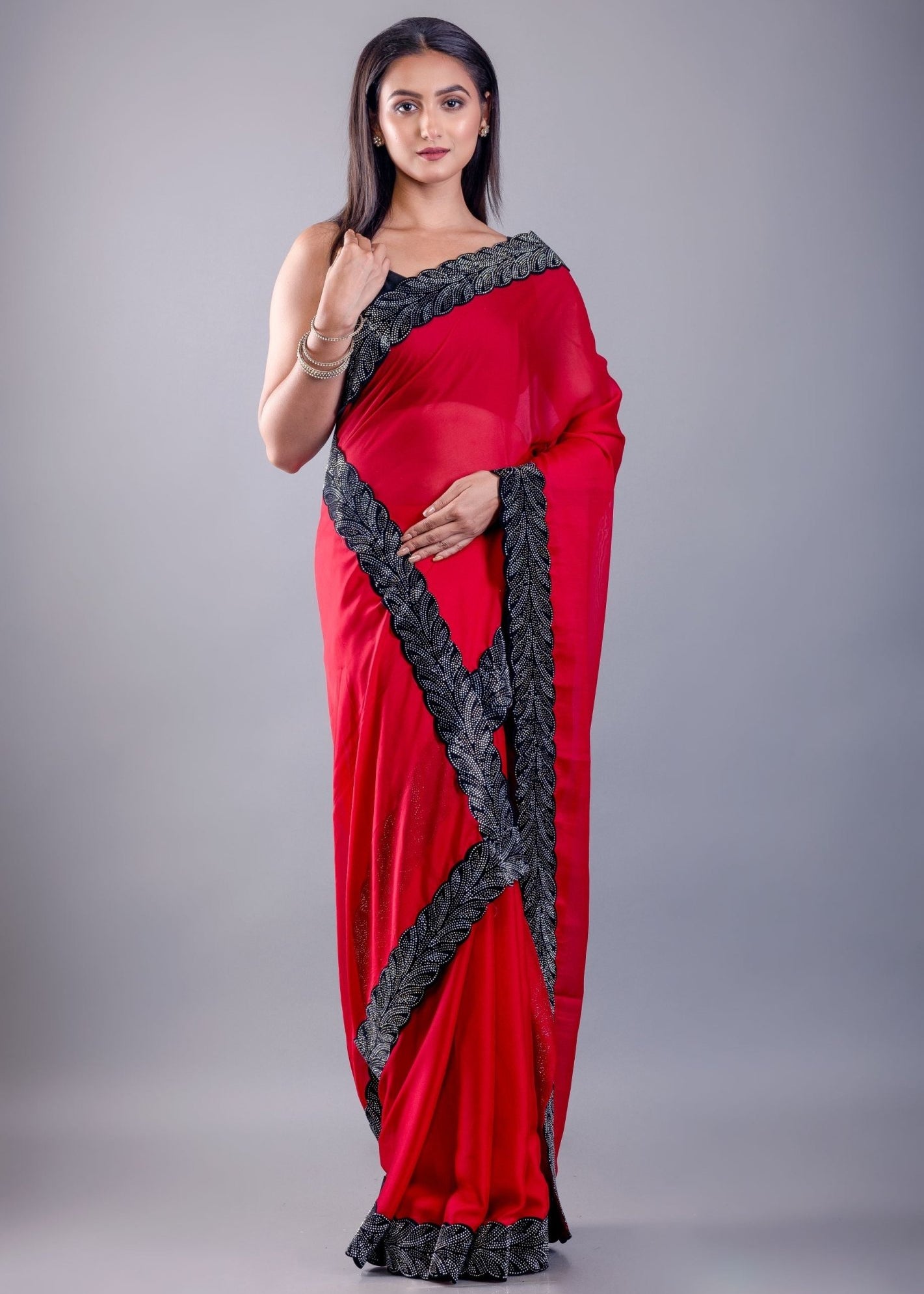 Red Jimmy Choo Saree with Black Stone Emblishment Border - Anvi Couture