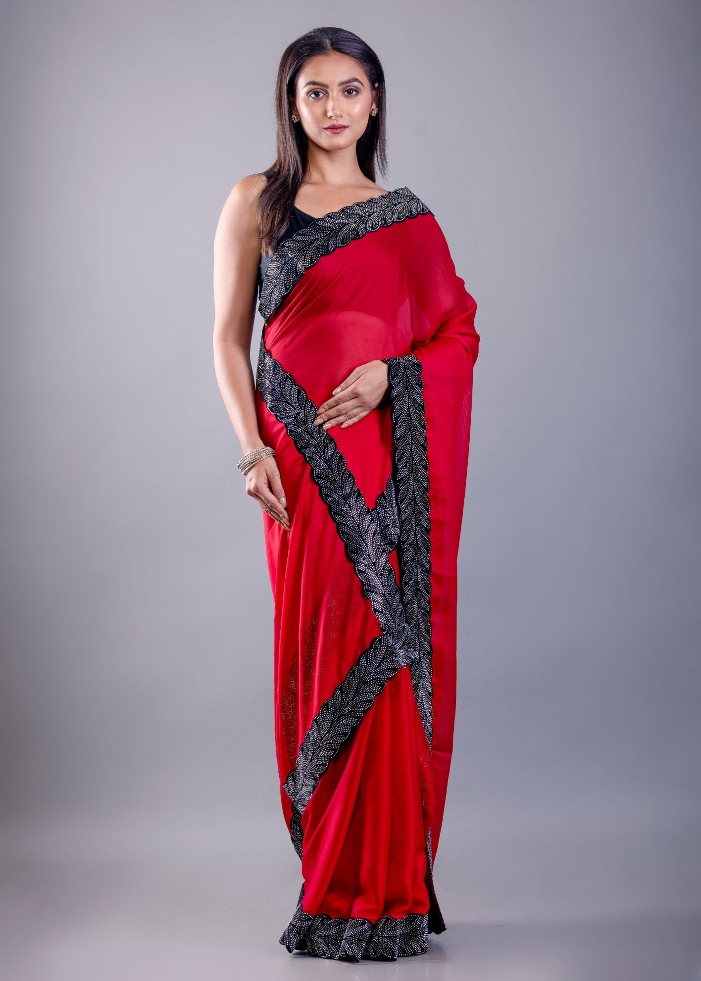 Red Jimmy Choo Saree with Black Stone Emblishment Border - Anvi Couture