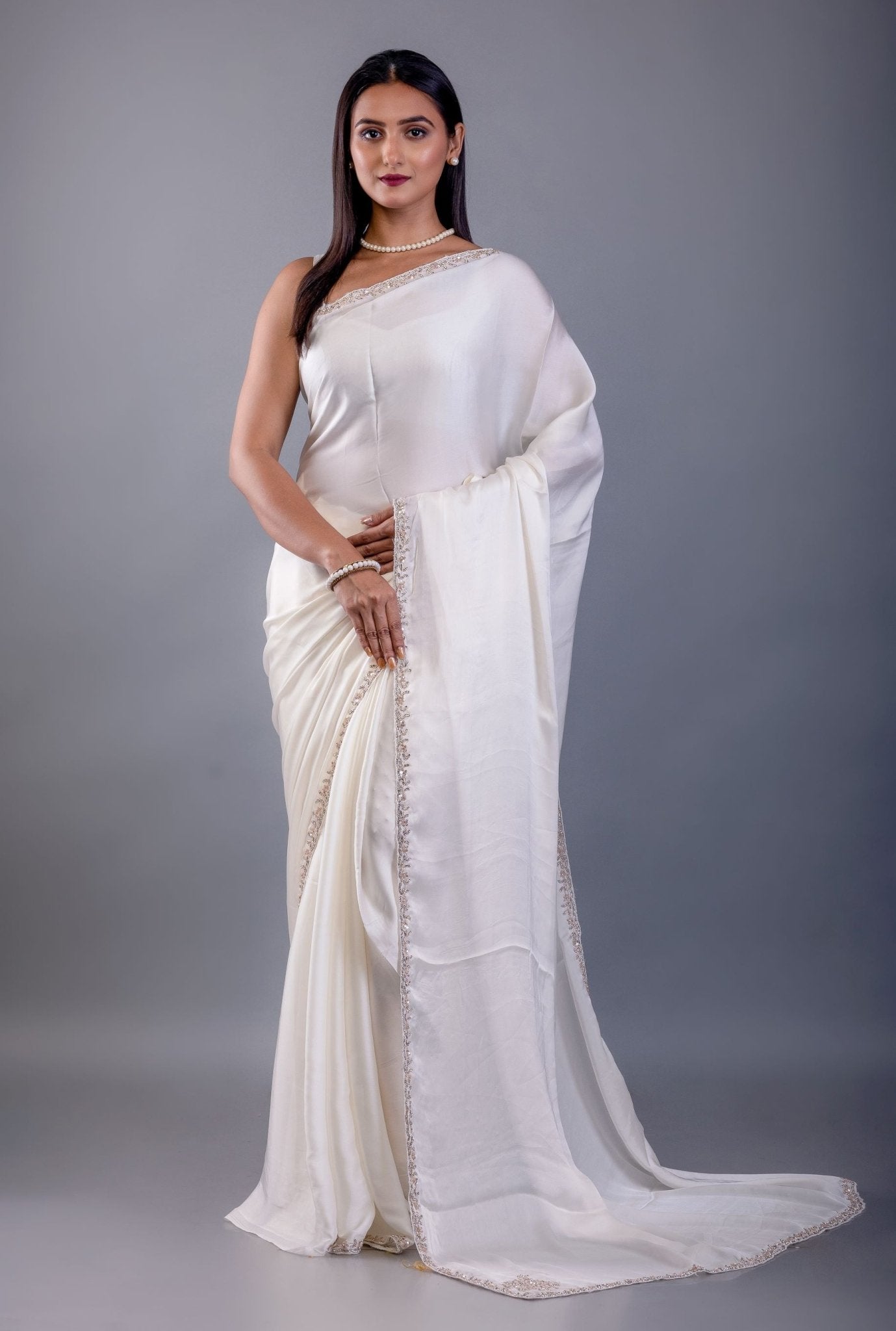 Off White Crepe Silk Saree with Hand Embroidered Border - Anvi Couture