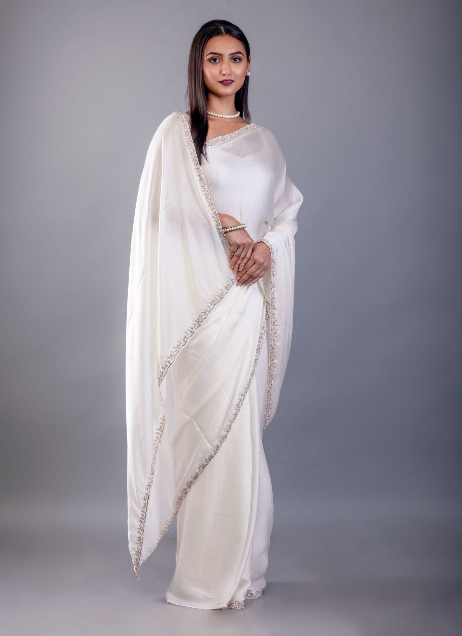 Off White Crepe Silk Saree with Hand Embroidered Border - Anvi Couture
