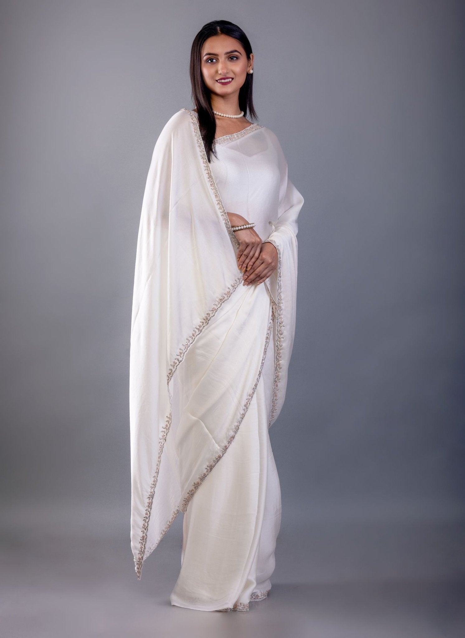 Off White Crepe Silk Saree with Hand Embroidered Border - Anvi Couture