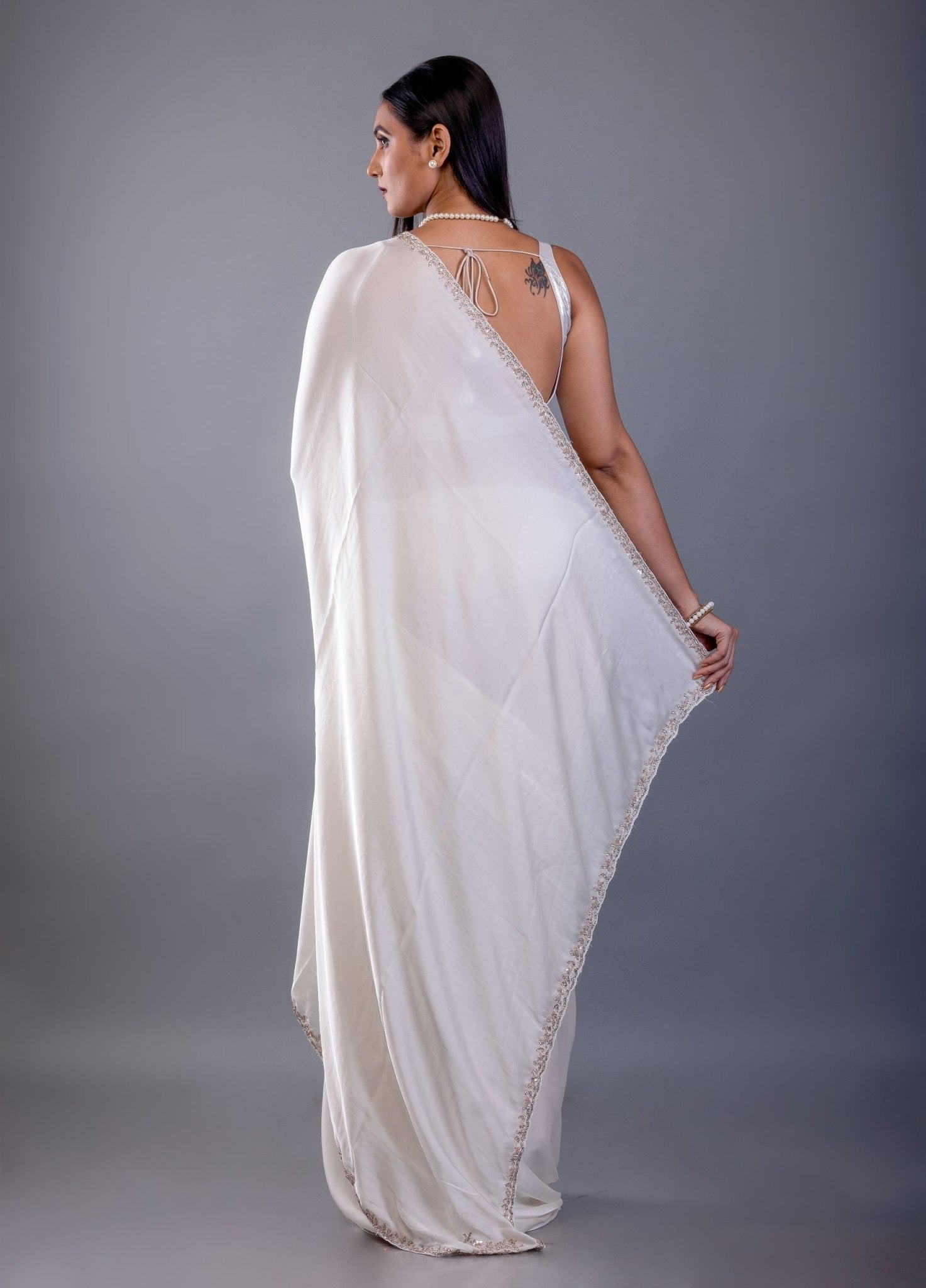Off White Crepe Silk Saree with Hand Embroidered Border - Anvi Couture