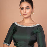 Dark green hand-embroidered silk boat neck blouse — front view