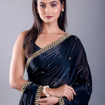 Deep blue satin silk saree — drape view highlighting hand-embroidered cutdana embellishment on body