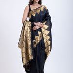 Designer Black Soft Silk Saree With Golden Geometric Border Front