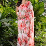 Designer Peach Georgette Saree with All - Over Floral Prints - Anvi Couture
