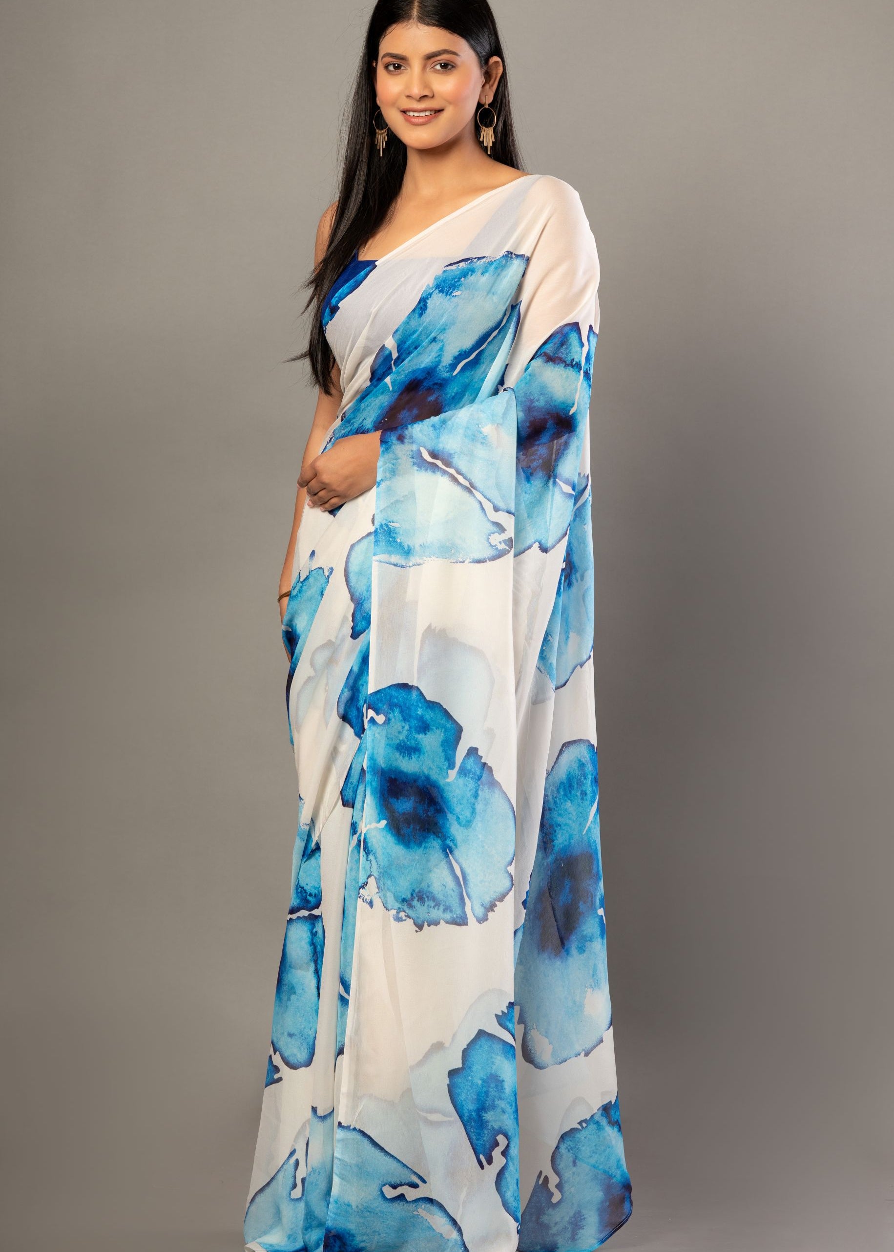 Designer White Georgette Saree with Blue Abstract Print
