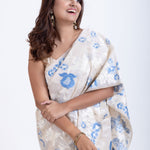 Dhakai Jamdani Saree in White with Blue Floral Motifs Close Up

