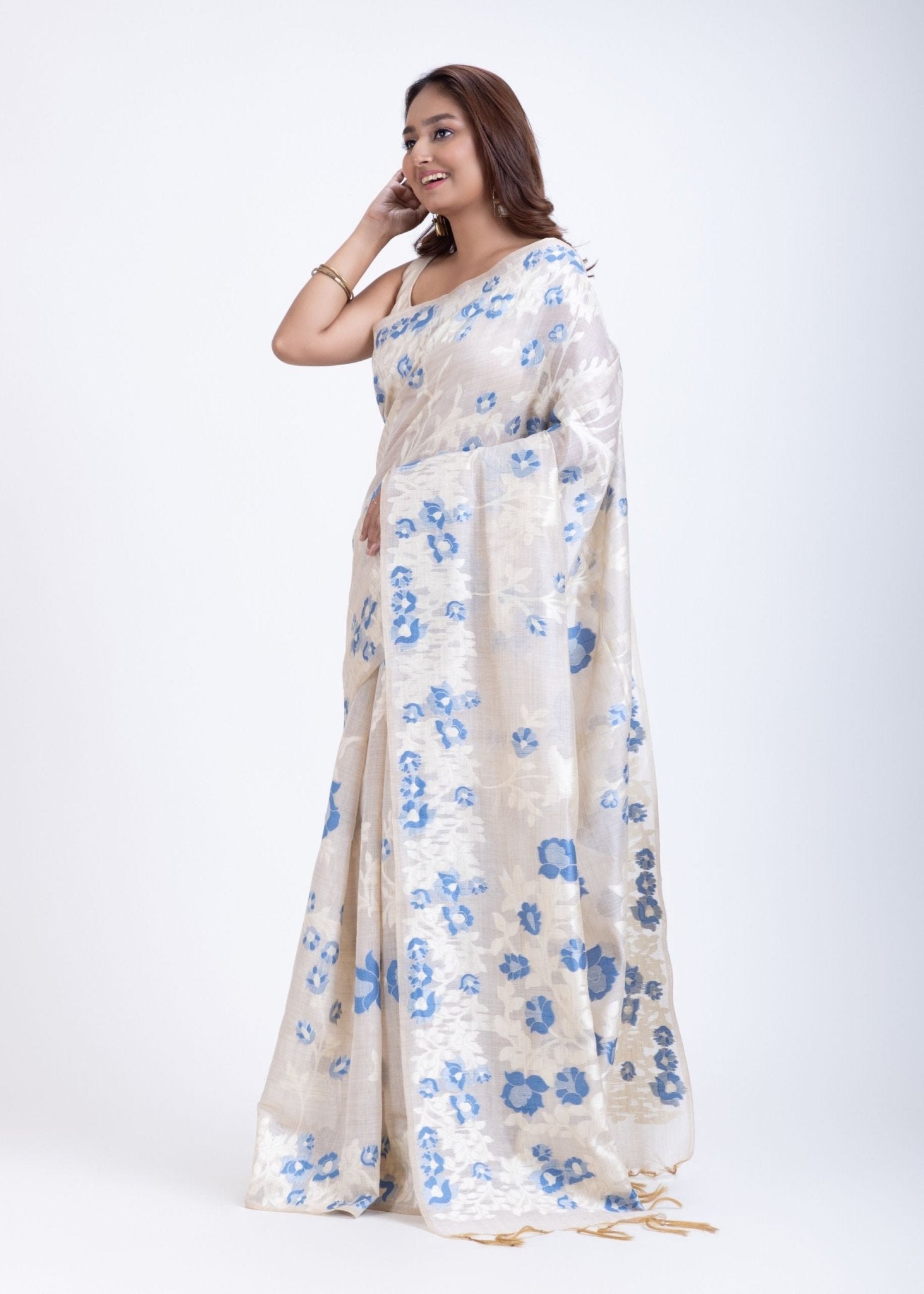 Dhakai Jamdani Saree in White with Blue Floral Motifs - Anvi Couture